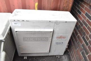 Fujitsu AOU36CLX metal split type air conditioner, 33,100 BTU, visible wear, 208/230V, 1 phase, with Fujitsu Halcyon logo.