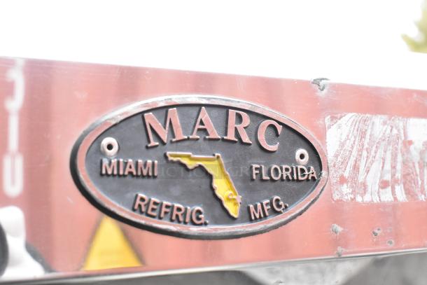 Marc Metal Commercial Merchandiser label, featuring Miami and Florida text on a metallic surface.