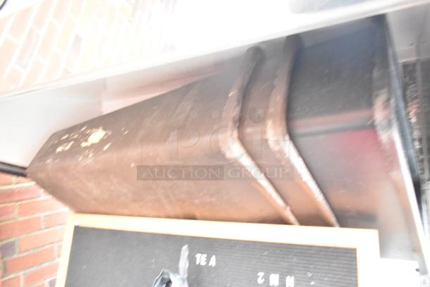 Marc Metal Grab N Go Merchandiser showing wear, features spacious open design for commercial use, includes contents.