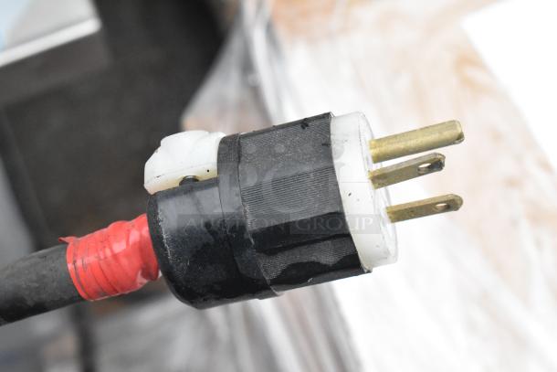 Marc Metal Commercial Floor Style Grab N Go Merchandiser, close-up of power plug with red tape, good condition.