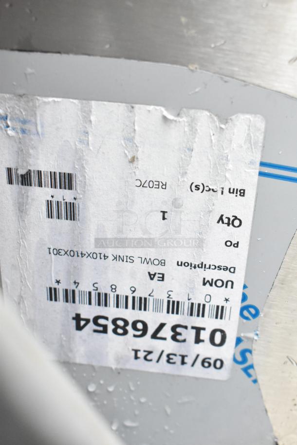 Label on Middleby Fabrication stainless steel commercial sink, showing part and model numbers, and barcode.