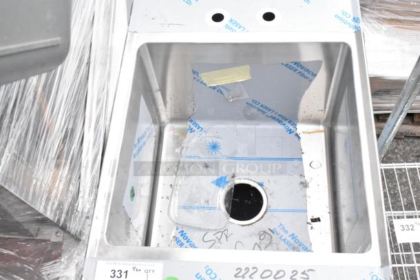 Brand new Middleby stainless steel commercial single bay sink, scratch and dent, visible protective film, and drain opening.