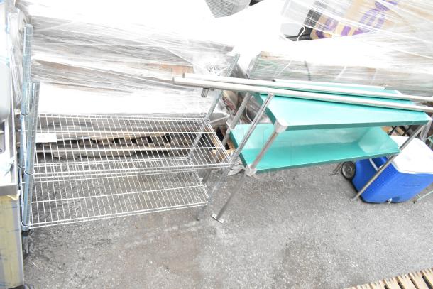 Two-tier chrome wire shelving unit and green metal two-tier shelving unit, both in good condition.
