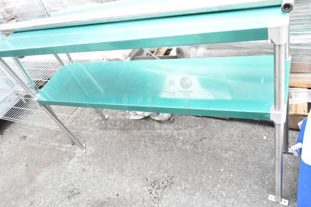 Chrome finish 2-tier wire shelving unit and metal 2-tier shelving unit, both in used condition.