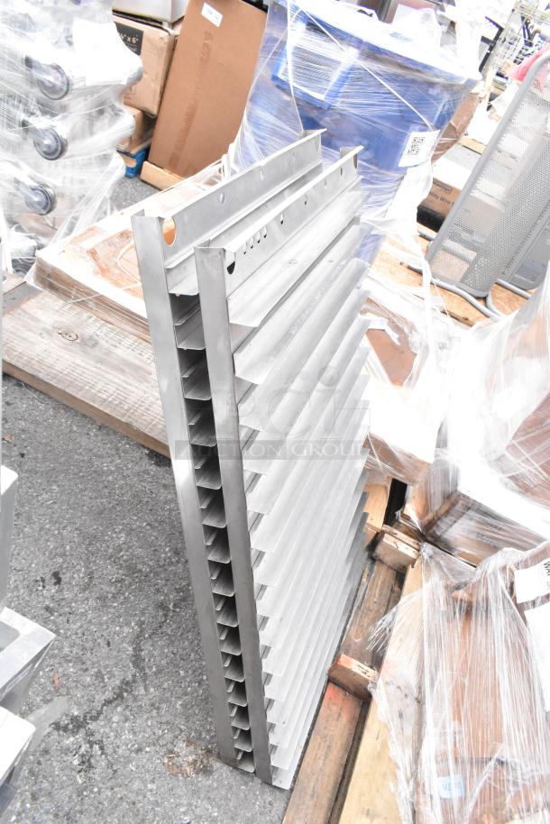 Two stacked metal panels with ribbed design, new condition, on wooden pallets, auctioned as "2 Times Your Bid."