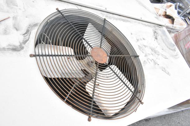 Lennox SGA036H4BT1G metal heating/cooling condenser, 480V, 3-phase, visible wear, fan grill shown.