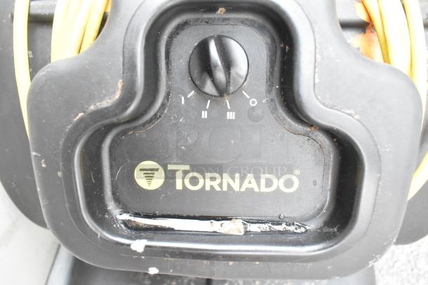 2 Tornado 98774 air mover fans, 120 volts, with control dial. Minor wear visible.