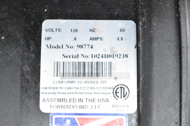 Label on Tornado 98774 air mover, 120V, 0.6 HP, 4.8 Amps, conforming to ANSI/UL 507, assembled in USA. Serial No. 1024B019238.
