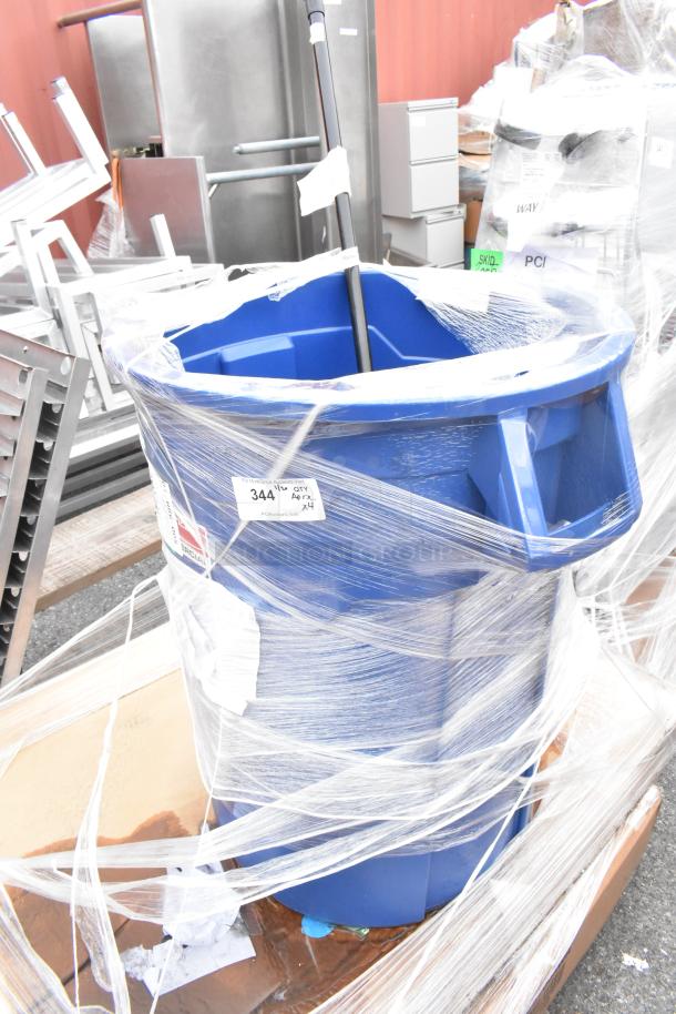 Four brand new scratch and dent items including blue bin wrapped, Aarco ADC3648L message center, white dining table.