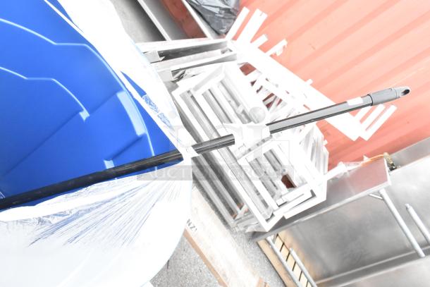 Aarco ADC3648L 36"x48" enclosed aluminum message center with black letter board, wrapped for protection, alongside metal frames.