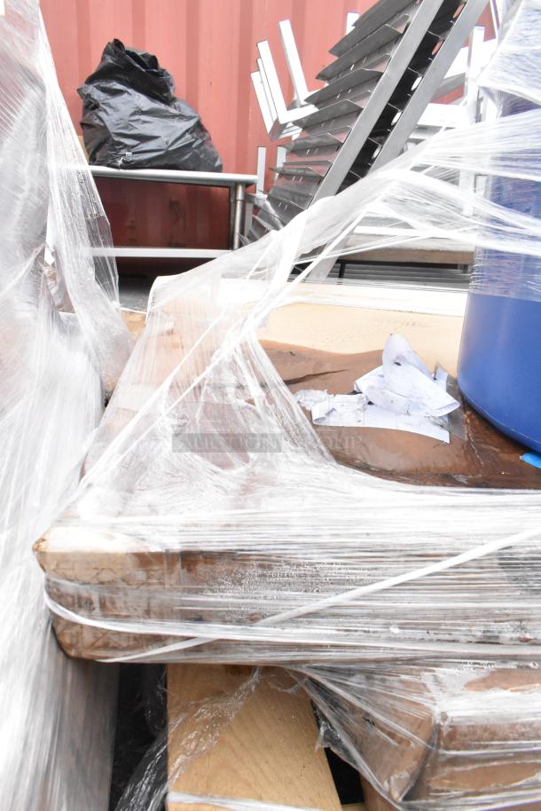 Four brand new wrapped items, including Aarco ADC3648L enclosed message center and KC57003WH dining table, scratch and dent condition.