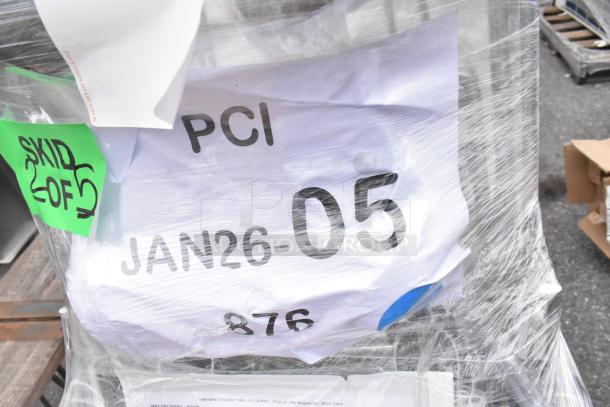 Four brand new scratch and dent items wrapped in plastic. Includes PCI, JAN26-05, and green "SKID OF" labels. Chrome finish units.