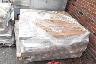 50 brand new scratch and dent items, including rolls of clear vinyl table cover protector, packaged on pallets.