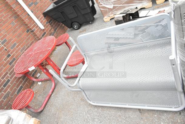 Red mesh table with two integrated seats and two gray mesh benches. Outdoor set, used condition.