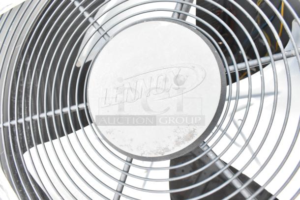 Lennox SS5006H4S44Y metal condenser fan, 208/230V, 1/3 phase, visible logo, sturdy metal grill, commercial use.