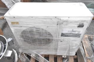 Emerson XFAM-037X-TFC-081 metal split type air conditioner, 208-230 volts, 3 phase, wrapped, with visible model label.