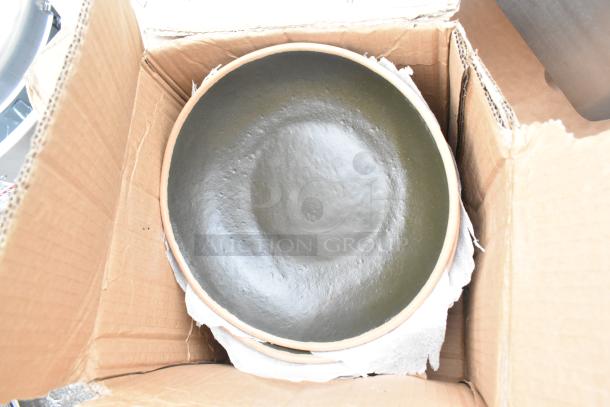 Cardboard box with a new black salad bowl inside. Bowl appears in excellent condition, neatly packaged.