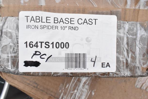 Label on box reading "TABLE BASE CAST IRON SPIDER 10" RND," model 164TS1000, indicating contents of the package.