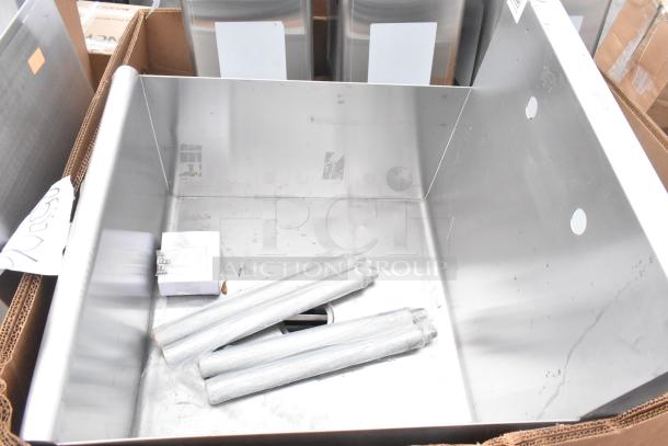 Brand new stainless steel dump sink with protective packaging, part of a 5-item scratch and dent auction lot.