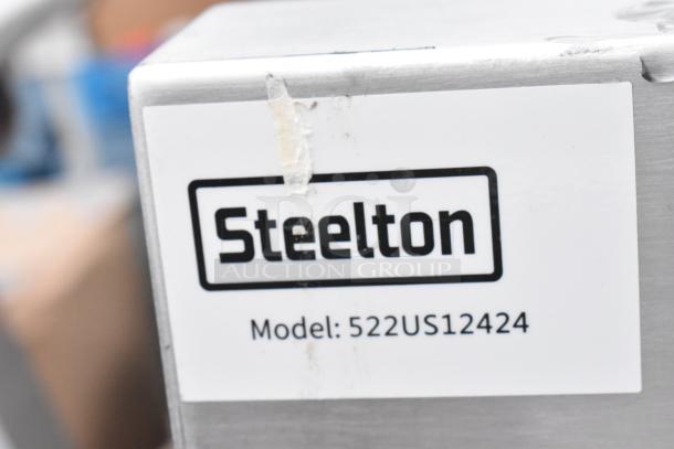 Steelton label on scratch and dent item, Model: 522US12424, possibly a sink unit. Brand new condition despite minor damage.