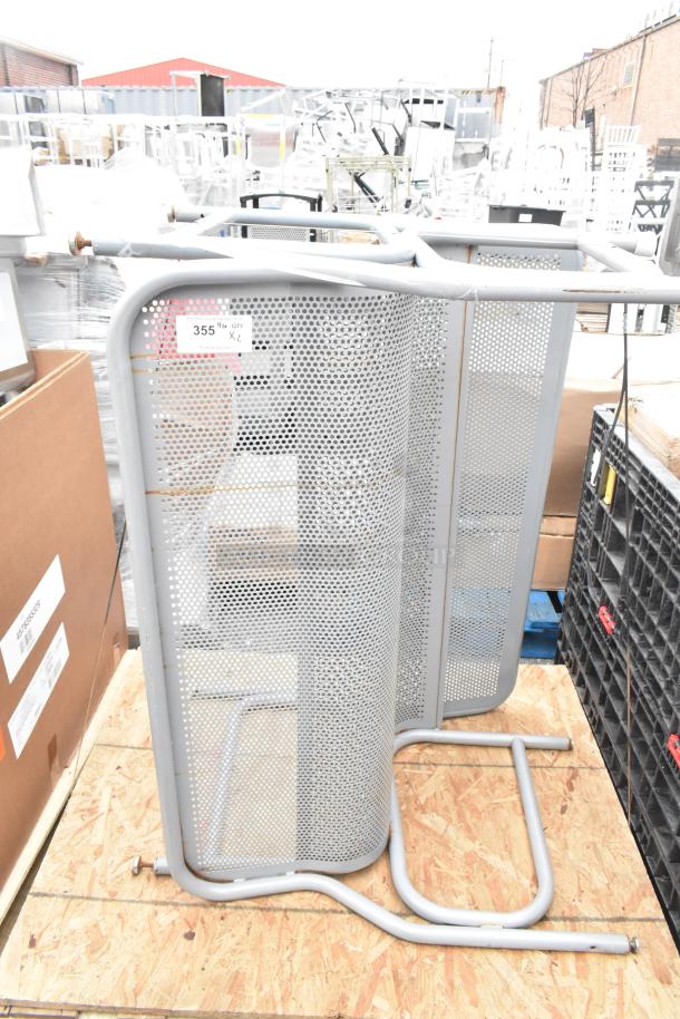 Two gray mesh benches, metal frame, perforated design, gently used. Auction includes two benches, sturdy and modern style.