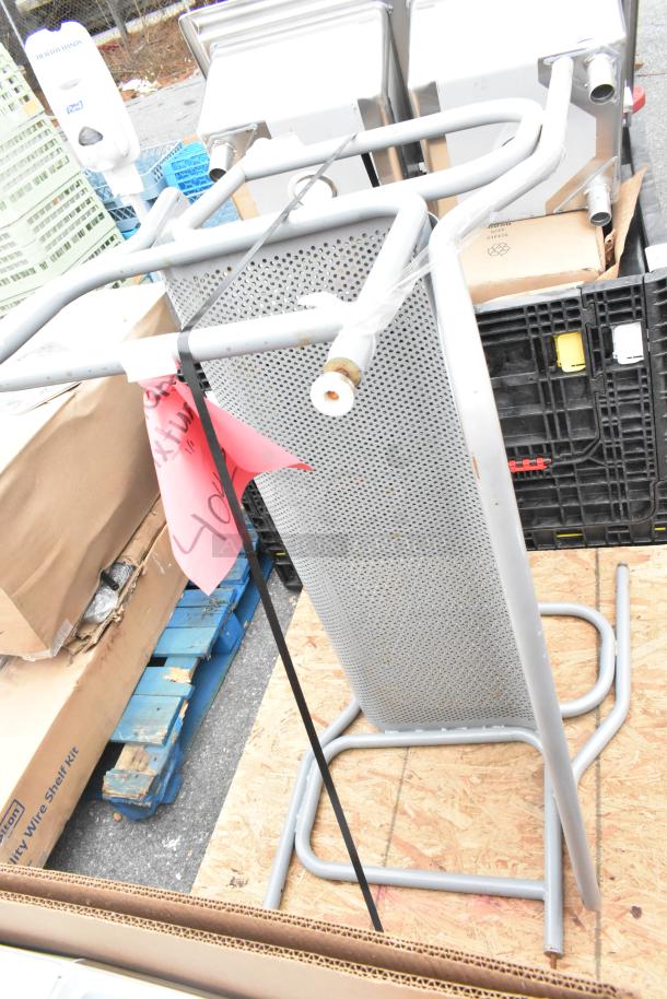 Two gray mesh benches, metal construction, flat-pack, light scratches, visible pink auction tag with number 404.