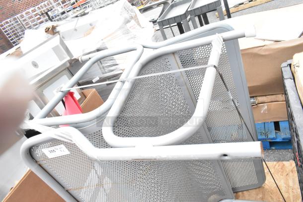 Two gray mesh benches stacked, featuring perforated metal design. Condition appears used. Quantity tag marked "355 Qty XL."