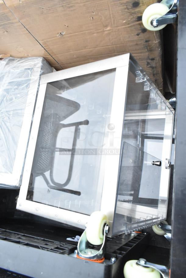 Auction lot with 8 new items, including a metal-framed sink, mop sink, and dolly, showing protective wrapping.