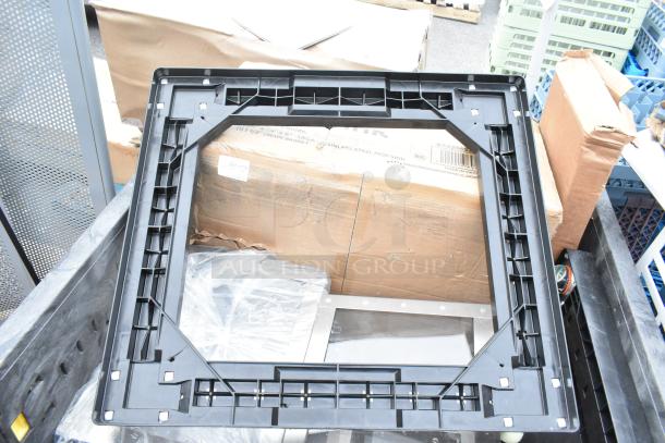 8 new scratch and dent items, including sink and dolly, in original packaging. Visible box label for mop sink.