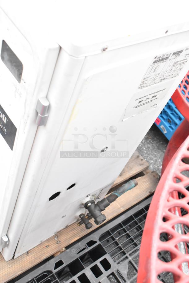 Emerson XFAM-037Z-TFC-081 metal split type air conditioner, 208-230 volts, 3 phase, visible connections and labels.