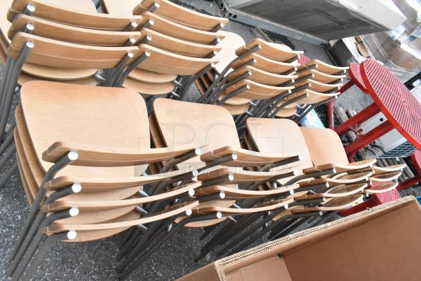 Stacked wood pattern chairs with chrome-finished frames, available in a lot of 30. Sturdy and ideal for dining height usage.