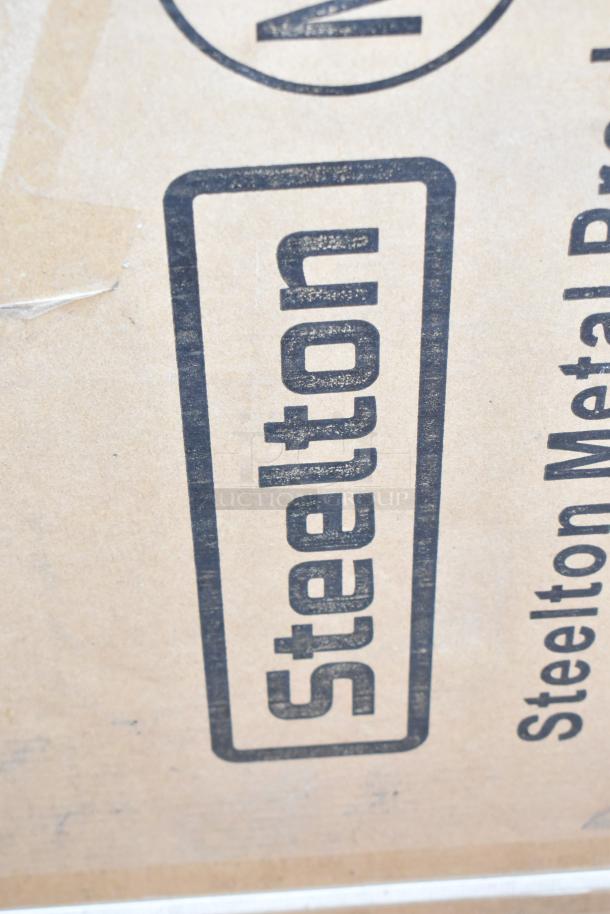 Brand new Steelton packaging. Contains Steelton 30" x 36" stainless steel work table with undershelf.