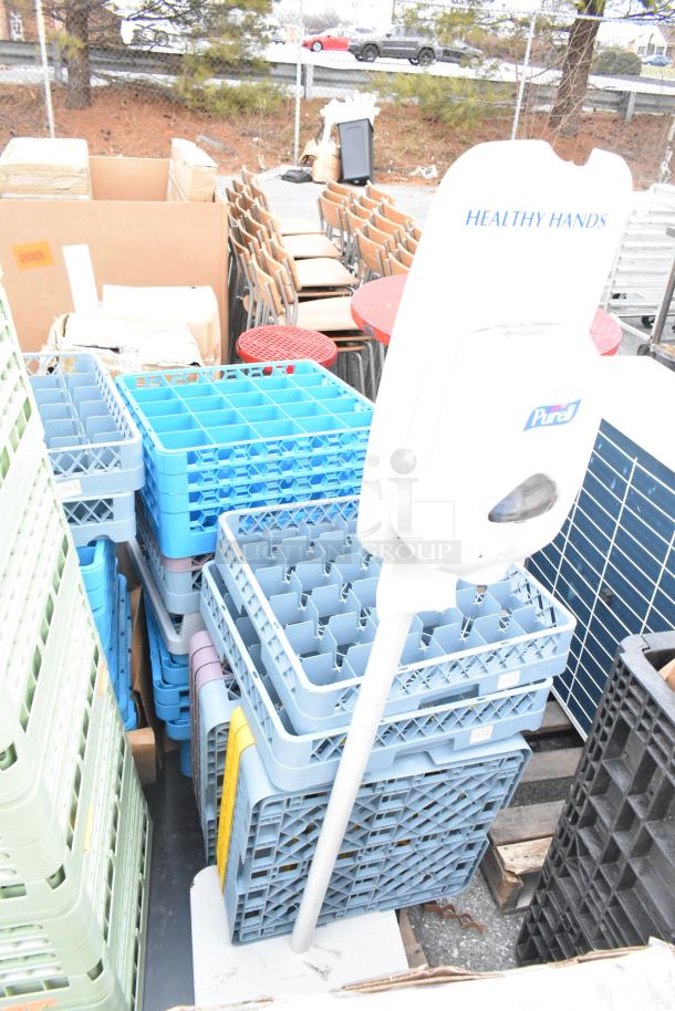Lot of various items including blue and green dish caddies, Purell dispenser, stacked chairs. Ideal for bulk purchase.