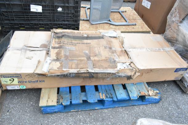 4 scratch and dent items in boxes, includes Aarco poster holder, Lancaster outdoor table, Steelton wire shelf kit, cross back chair.