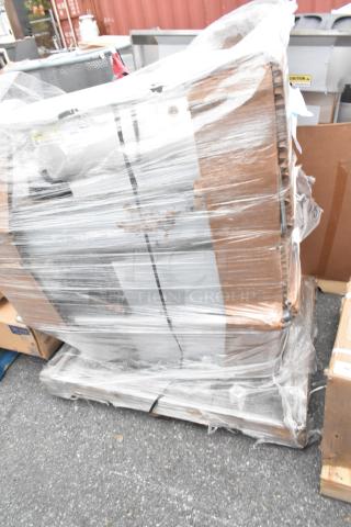 Plastic-wrapped pallet containing three brand new scratch and dent items, including sinks, ready for auction.