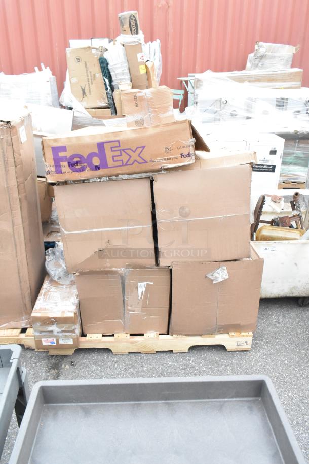 Stack of boxes marked FedEx, containing 8 new scratch-and-dent items, including boiler grate, door gasket, pin legs.