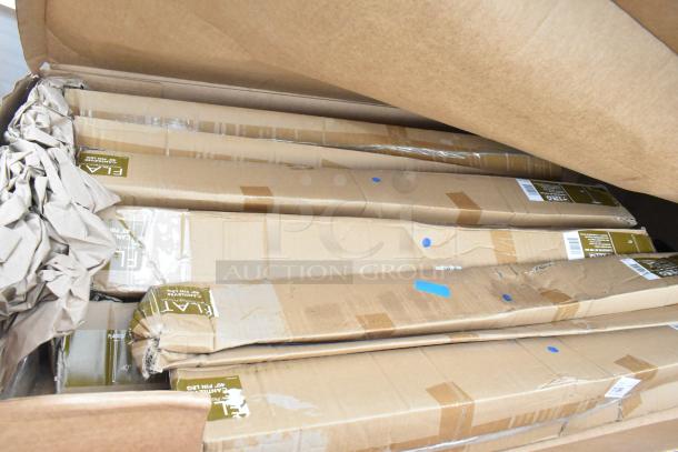 Box of 8 new scratch and dent items, including boiler grate, door gasket, and pin legs. Boxes show minor damage.