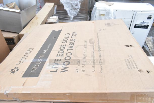 Lancaster solid wood tabletop box, live edge, 36" x 36", rustic walnut finish, new condition with minor box damage.