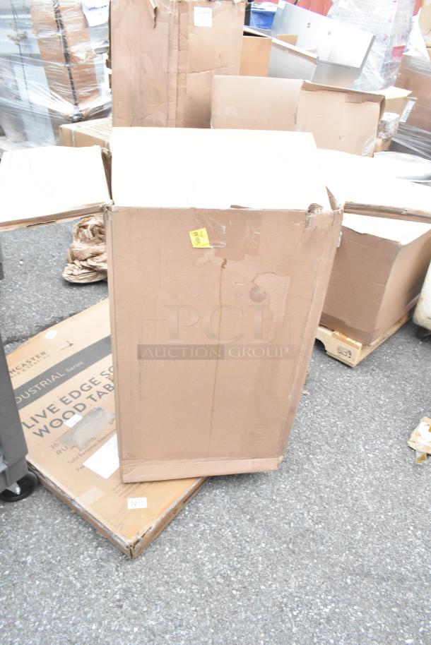 Cardboard boxes containing 8 brand new scratch and dent items, including a boiler grate and door gasket. Some wear on packaging.