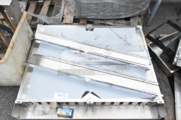 ALL ONE MONEY! PALLET LOT with assorted items including stainless steel pieces, metal rack, visible label "KFC 7351 CURTAIN."