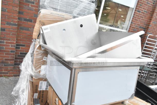 Stainless steel sink by Steelton, new with minor scratches, part of an 8-item auction bundle.