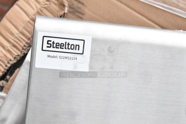 Steelton model 522MS2124 label on stainless steel item, part of 8 scratch and dent auction lot including wire shelves and sink.