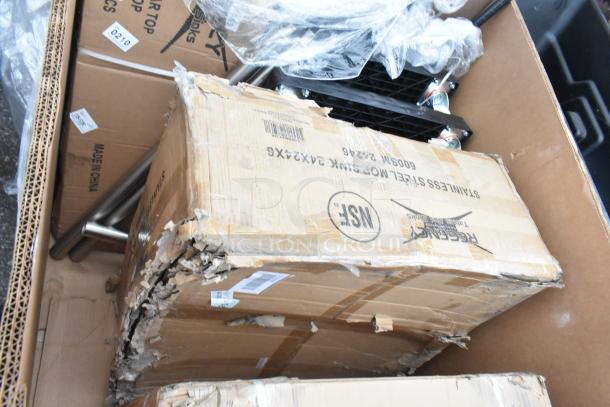 8 brand new scratch and dent items including wire shelves, sink, drawer. Visible box damage. Regency Sink markings, NSF label.