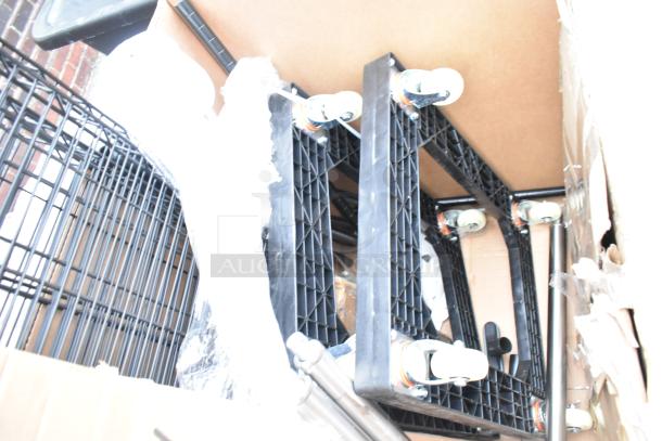 Eight new scratch and dent items including wire shelves and a sink. Features black frames and caster wheels.