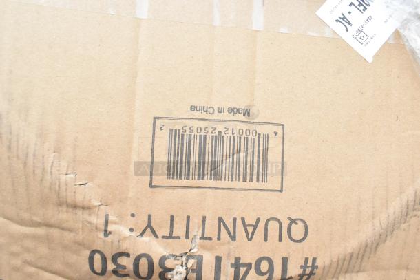 Cardboard box with a barcode and "Made in China" label. Contains new scratch and dent items: wire shelves, sink, drawer.