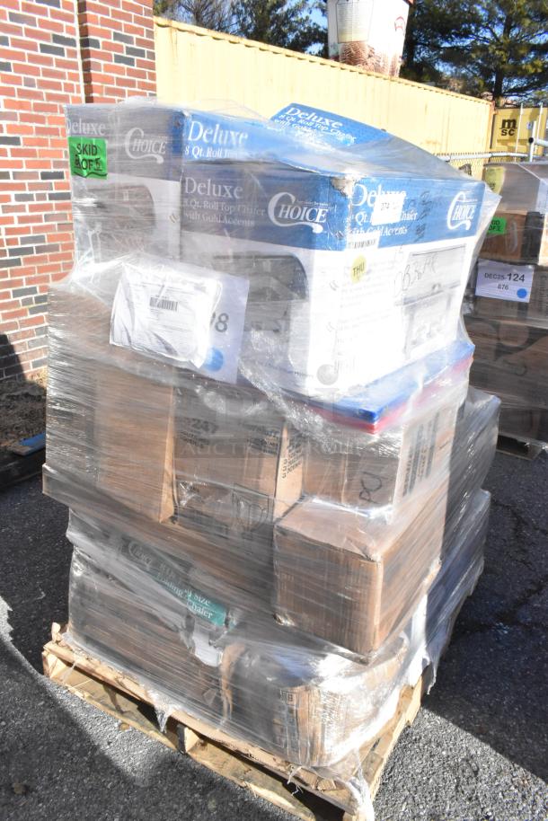 Pallet of assorted new scratch and dent items, including boxed wine glasses, trays, cutting boards, and chafers with visible packaging.
