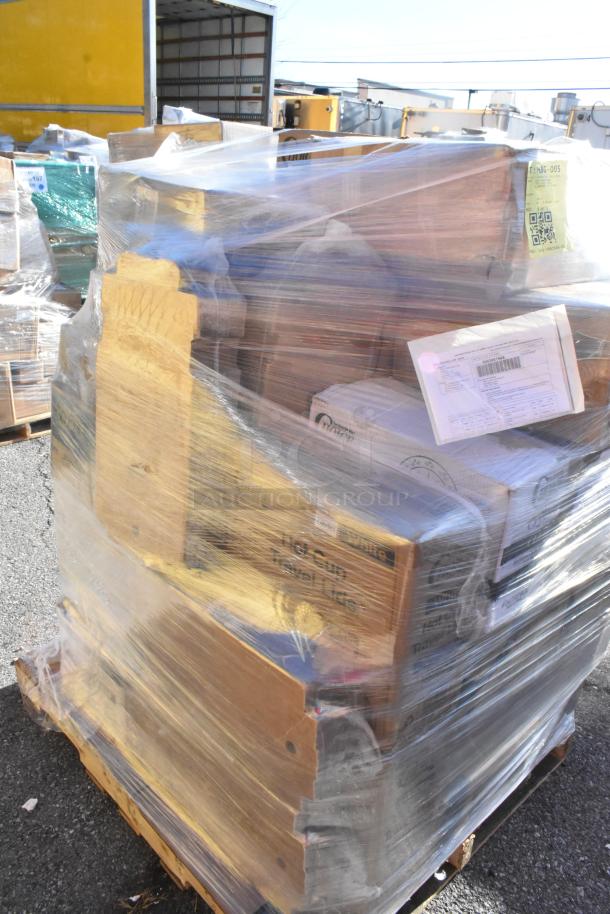 Wrapped pallet with 28 new scratch and dent items including cups, plates, straws, and pizza boxes. Label shows shipping info.