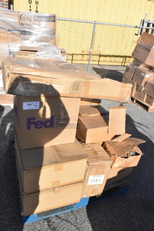 Pallet of 25 new scratch and dent items in boxes, including vacuum packaging pouches and cushions. Some boxes slightly damaged.