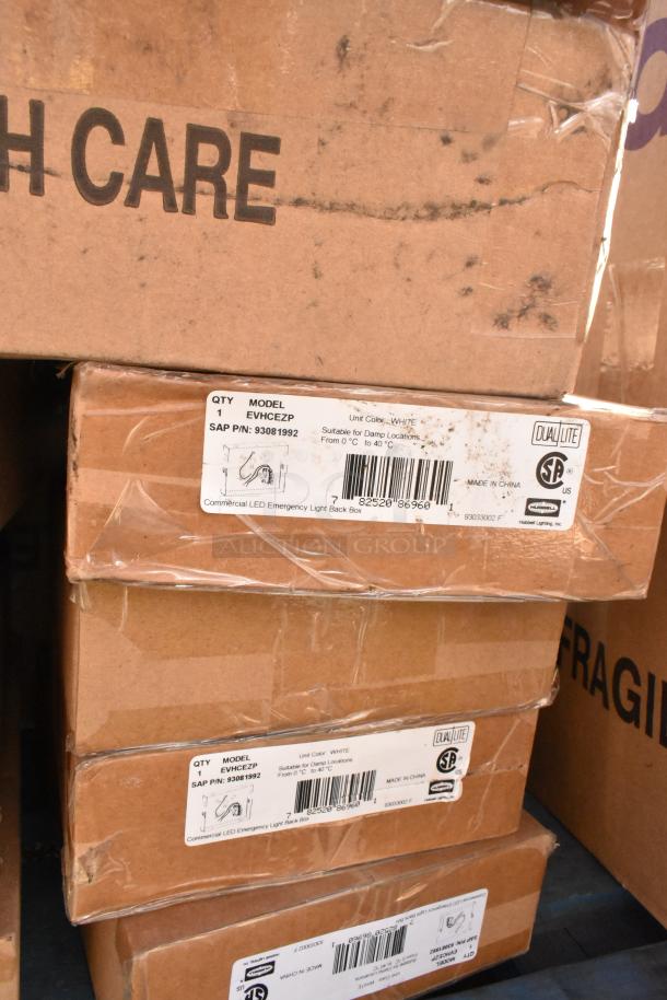 Boxes of Dalalite LED emergency light back boxes, model EVHCEZP, labeled for damp locations.