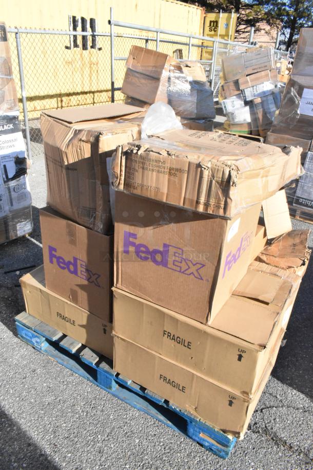 25 brand new scratch and dent items including vacuum packaging pouches, cushions. Boxes labeled "Fragile" and "FedEx."